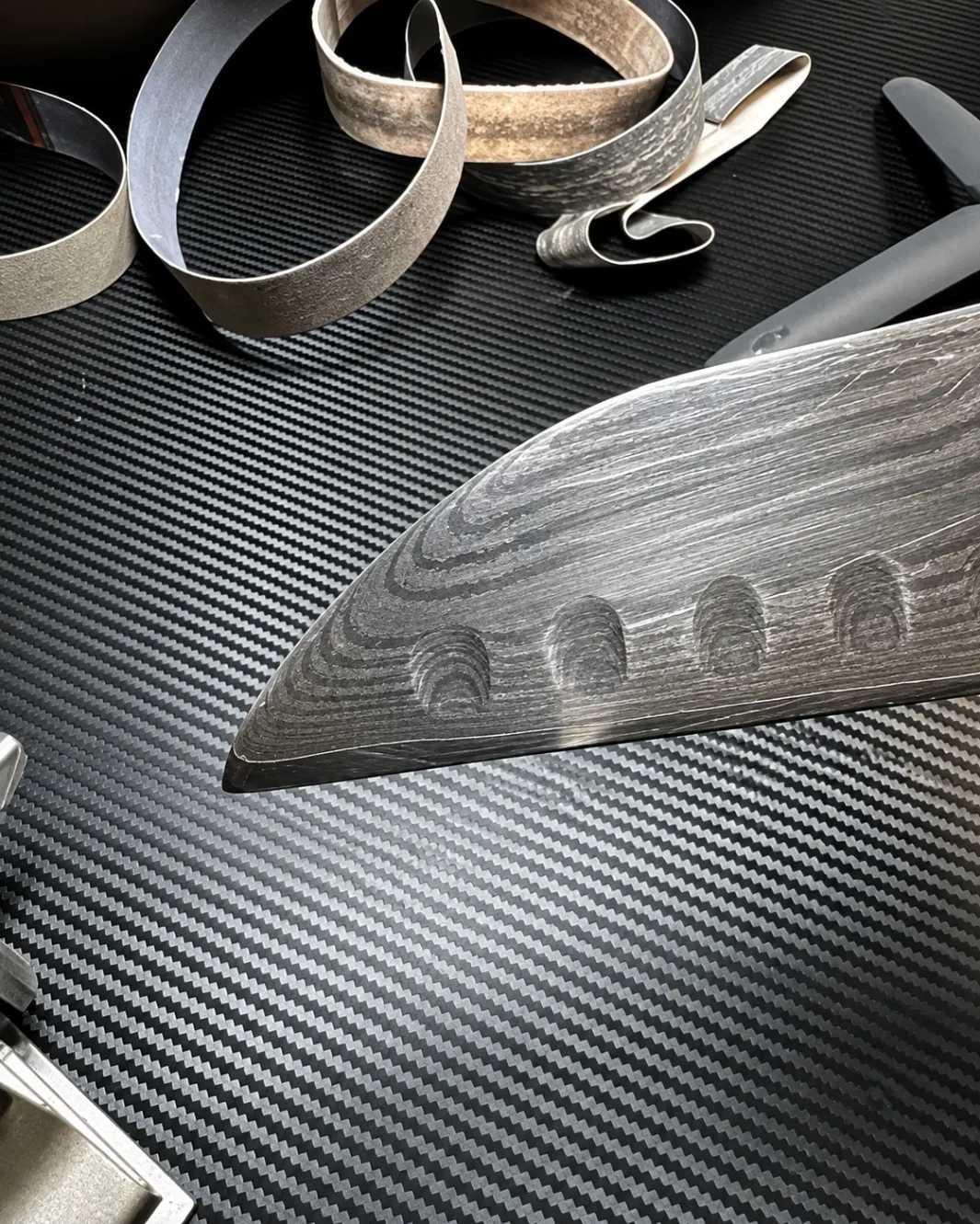 Close view of a knife blade sharpened by Erick