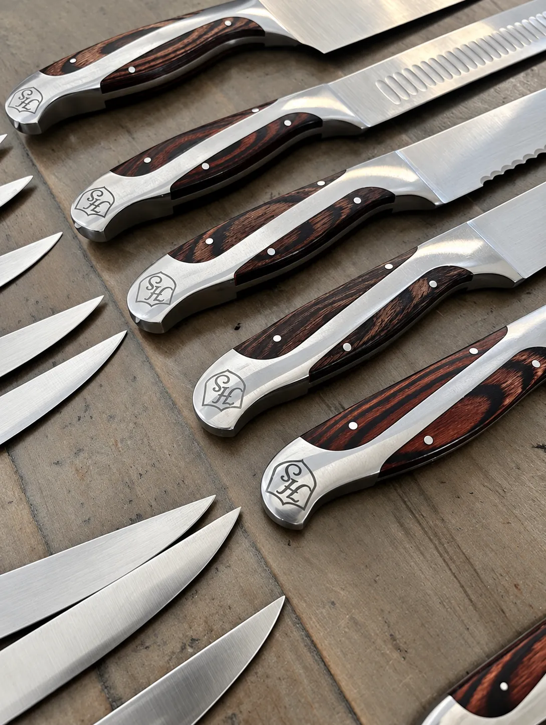 Professional kitchen knives prepared for recurring commercial sharpening service